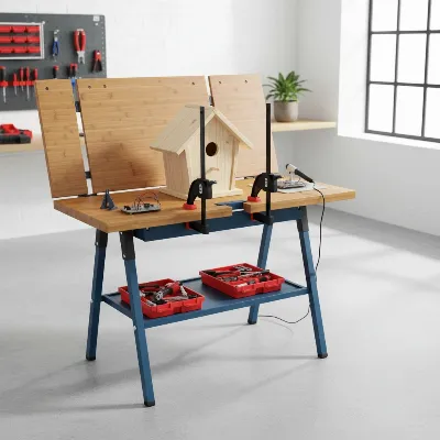Bosch PWB 600 folding work bench in a home workshop environment.